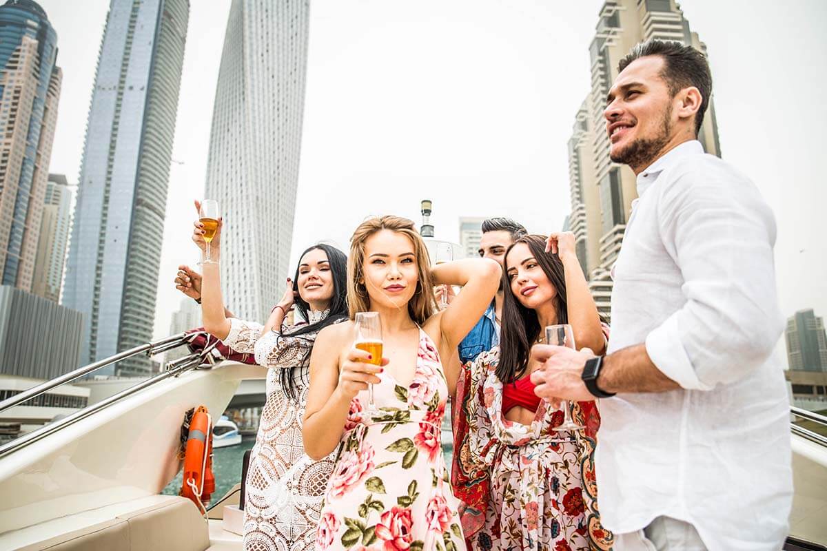 People celebrating on a yacht in Dubai