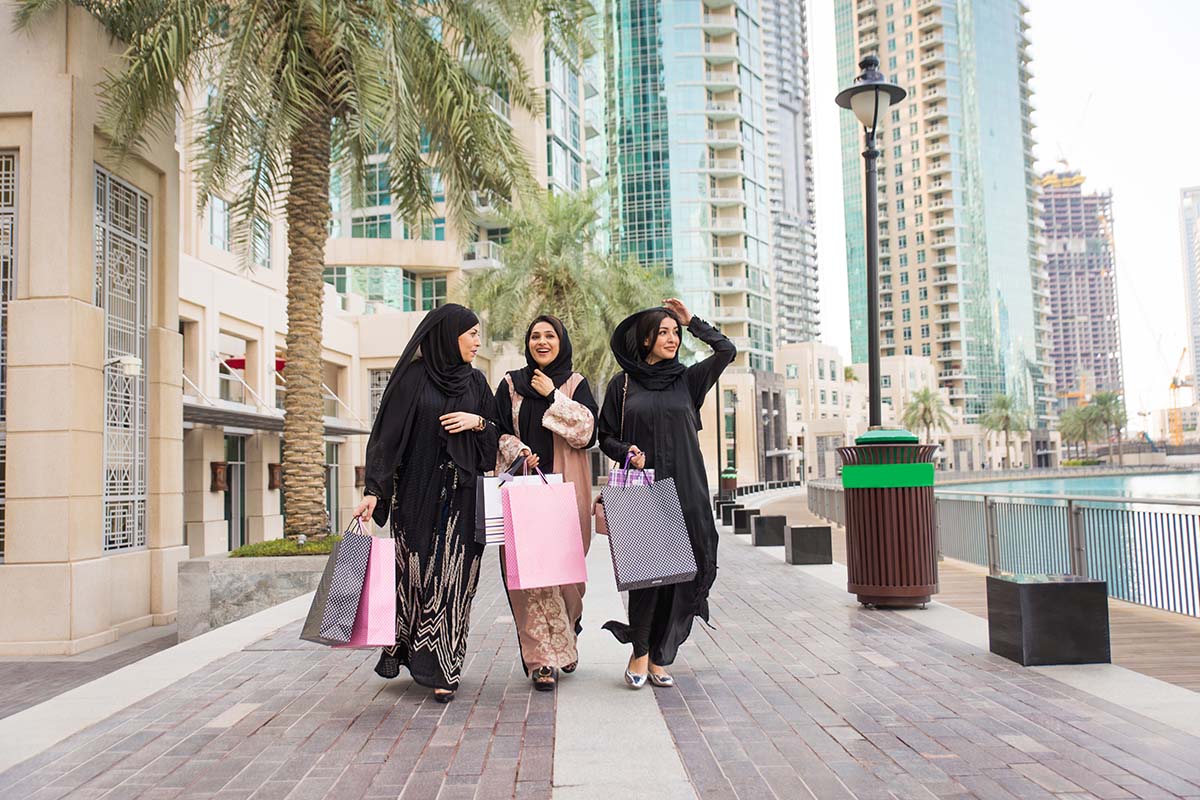 Happy women exploring Dubai malls
